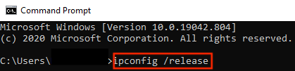 Screenshot: Windows Command Prompt open with the command "ipconfig /release" typed